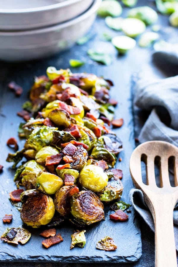 Crispy Brussels Sprouts with Bacon | Super crispy Brussels sprouts with bacon will soon become your new favorite go-to gluten-free and Paleo side dish recipe!  A few simple tricks will teach you how to make crispy Brussels sprouts every time.