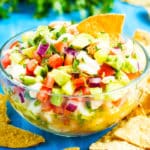 Easy Shrimp Ceviche Recipe | Mexican Shrimp Ceviche with Avocado is a refreshing low-carb, gluten-free, dairy-free, sugar-free, Paleo, and Whole30 appetizer recipe for these warmer months! Serve it with tortilla chips, on top of your favorite chicken dish, or eat it by the spoonful for lunch or dinner!