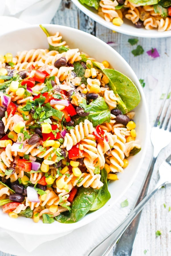 Healthy gluten-free pasta salad in a white bowl for lunch.