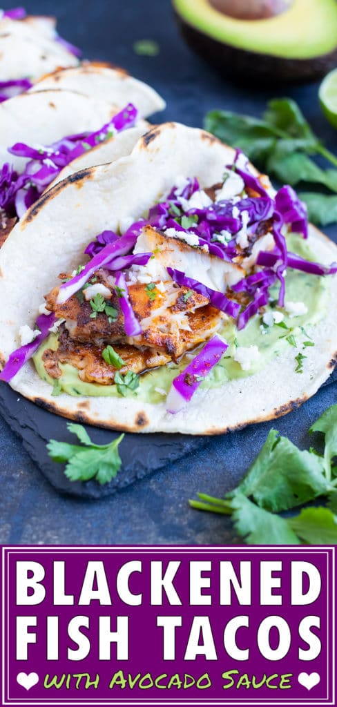A blackened fish taco recipe that is served with a homemade avocado sauce and topped with shredded cabbage.