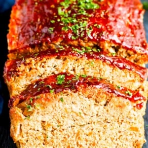 Gluten-free Ground Turkey Meatloaf sliced on a slab.