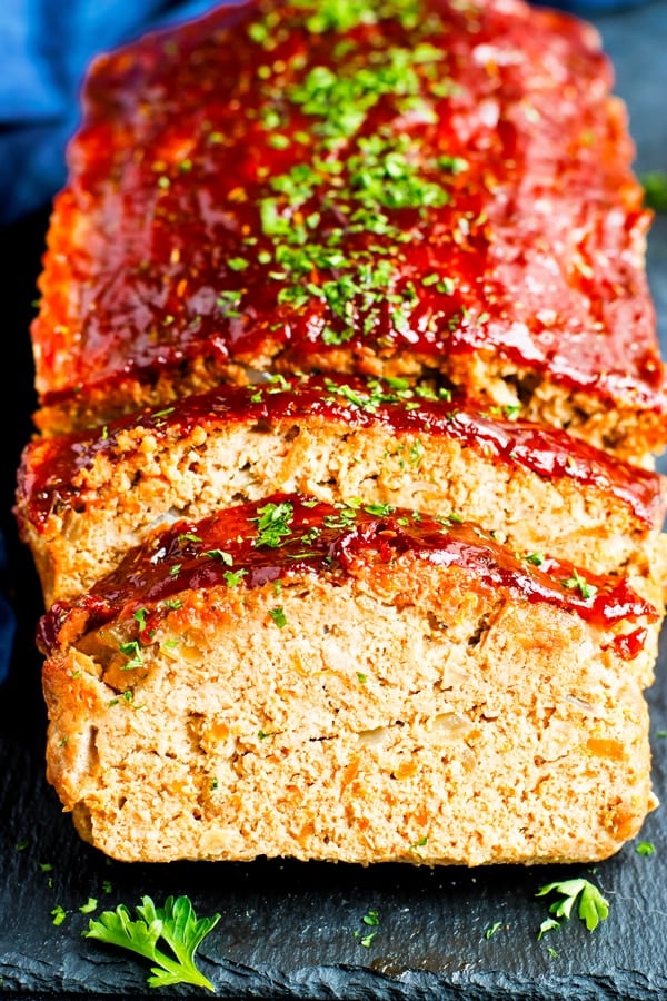 Gluten-free Ground Turkey Meatloaf sliced on a slab.