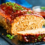 Gluten-free meatloaf with ground turkey on a slab for dinner.