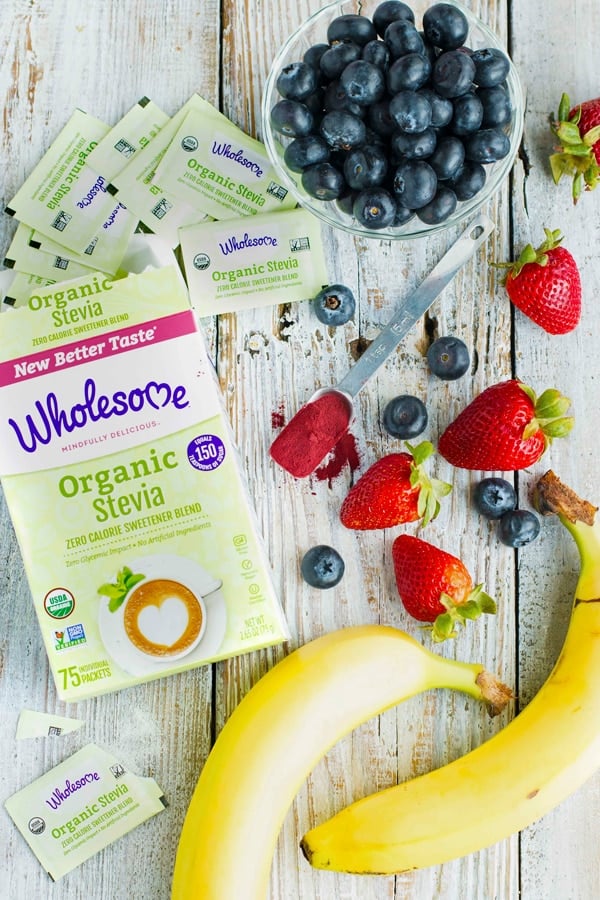 Wholesome Organic Stevia Package surrounded by berries and bananas.