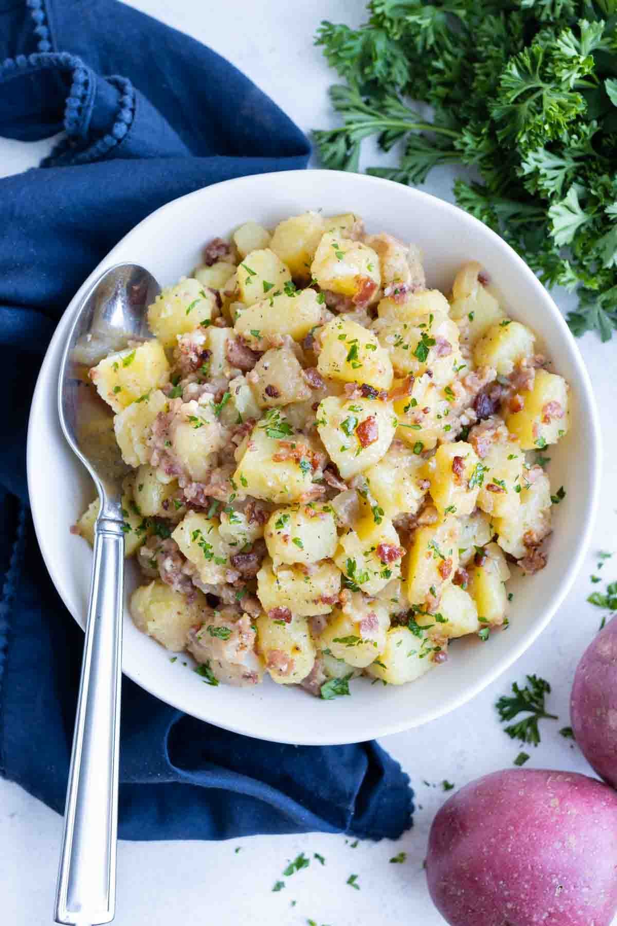 Traditional German potato salad is shown on the counter.