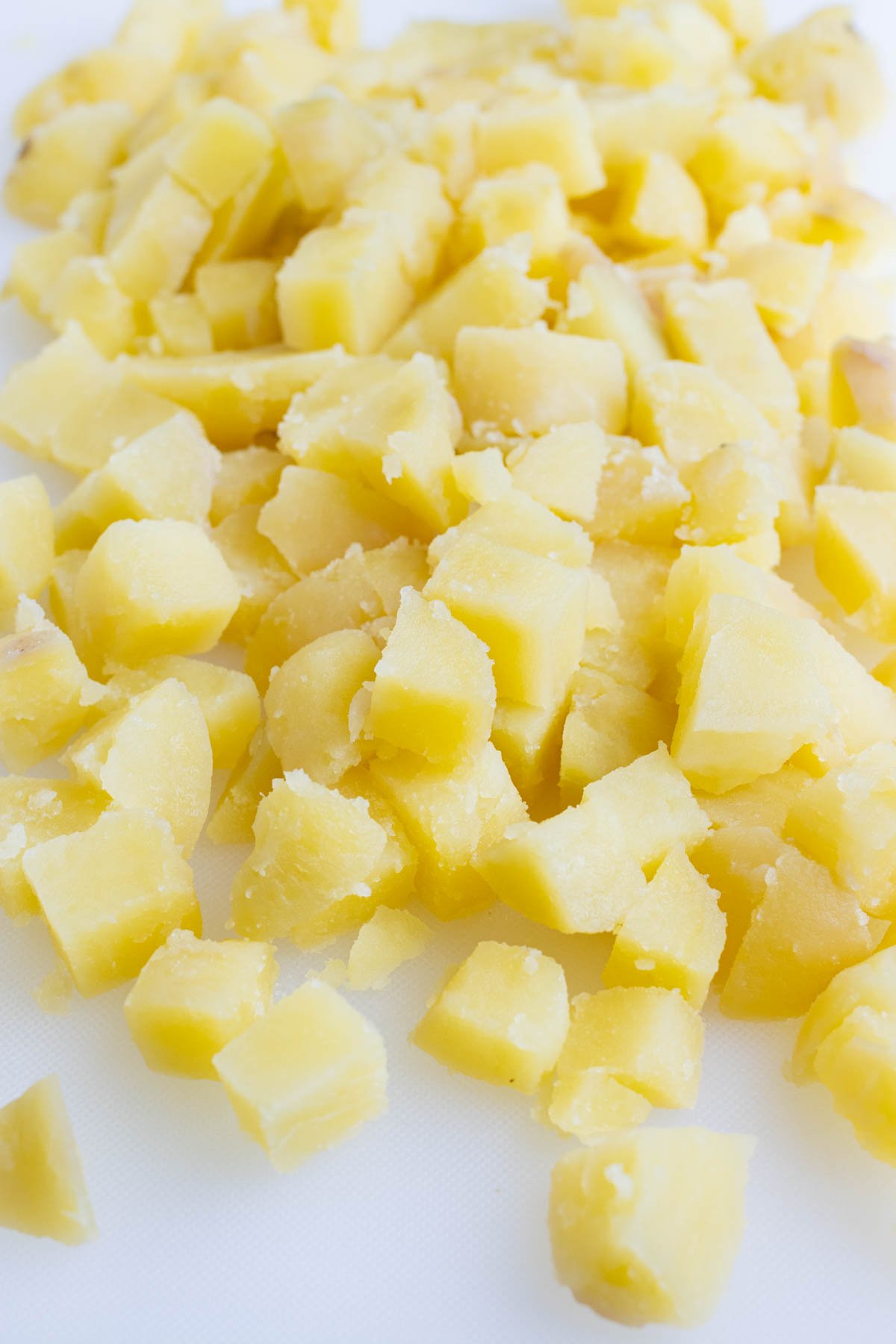Potatoes are diced into small cubes.
