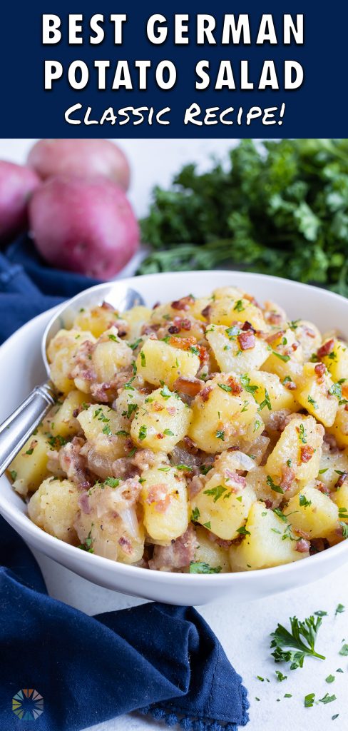 Warm potato salad is served in a bowl with a fork.