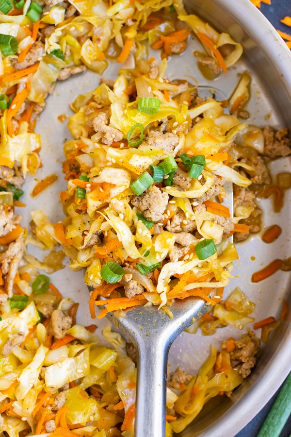 Whole30 Egg Roll in a Bowl Recipe | This Egg Roll in a Bowl recipe is loaded with flavor and is a Paleo, Whole30, and keto recipe to make for an easy weeknight dinner.  From start to finish, you can have this healthy and low-carb dinner recipe ready in under 30 minutes! It's a super easy and healthy ground turkey dinner recipe!