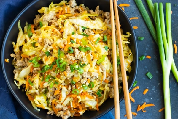 Paleo Egg Roll in a Bowl Recipe | This Egg Roll in a Bowl recipe is loaded with flavor and is a Paleo, Whole30, and keto recipe to make for an easy weeknight dinner. From start to finish, you can have this healthy and low-carb dinner recipe ready in under 30 minutes! It's a super easy and healthy ground turkey dinner recipe!