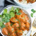 Overhead picture of Easy Slow Cooker Chicken Tikka Masala in a white bowl.