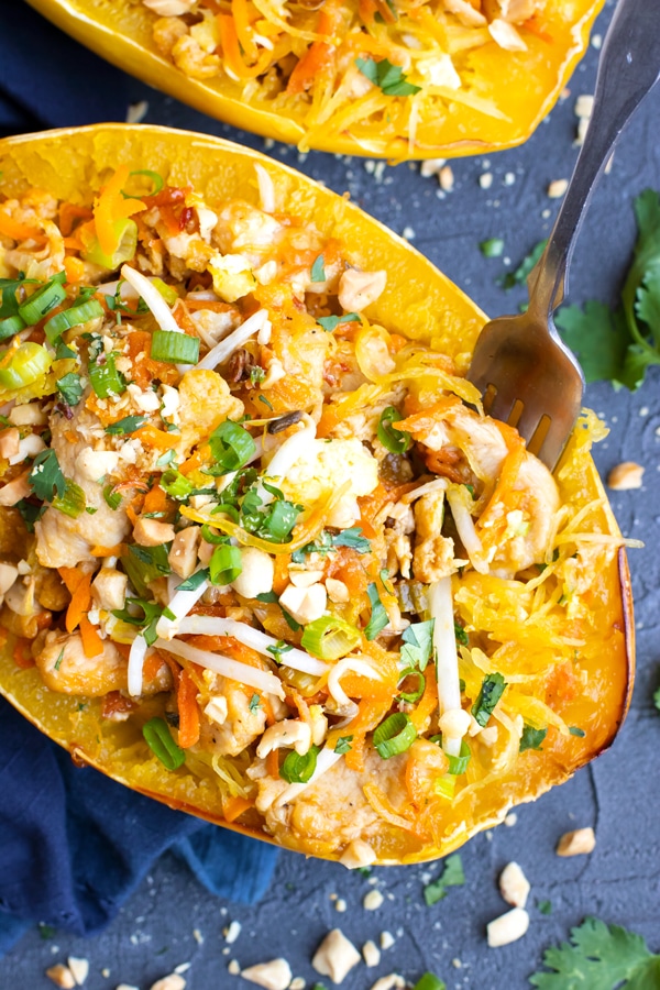 Spaghetti Squash Chicken Pad Thai with a fork placed inside.