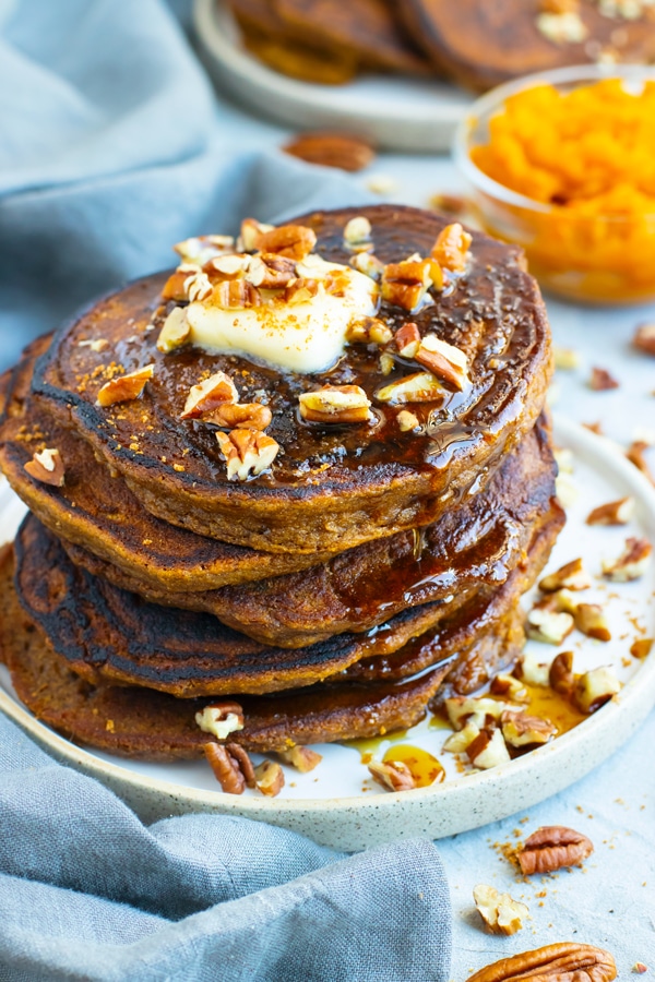 Gluten-free pumpkin pancakes made from cassava flour, maple syrup, and coconut oil.