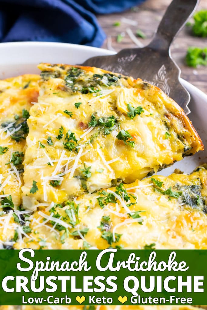 A slice of an egg bake recipe with spinach and cheese being picked up out of a casserole dish.