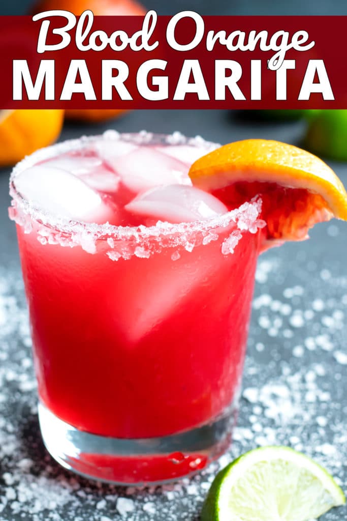 A homemade skinny margarita with a salted rim and a blood orange wedge for garnish.