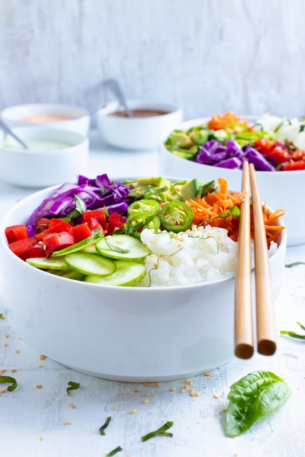 Rice bowl recipe made with Japanese sushi rice, avocado, cucumber, jalapeno, and carrots.