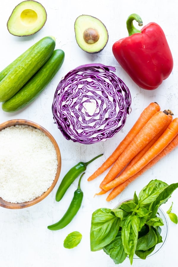 Ingredients in a sushi bowl recipe on a white background.