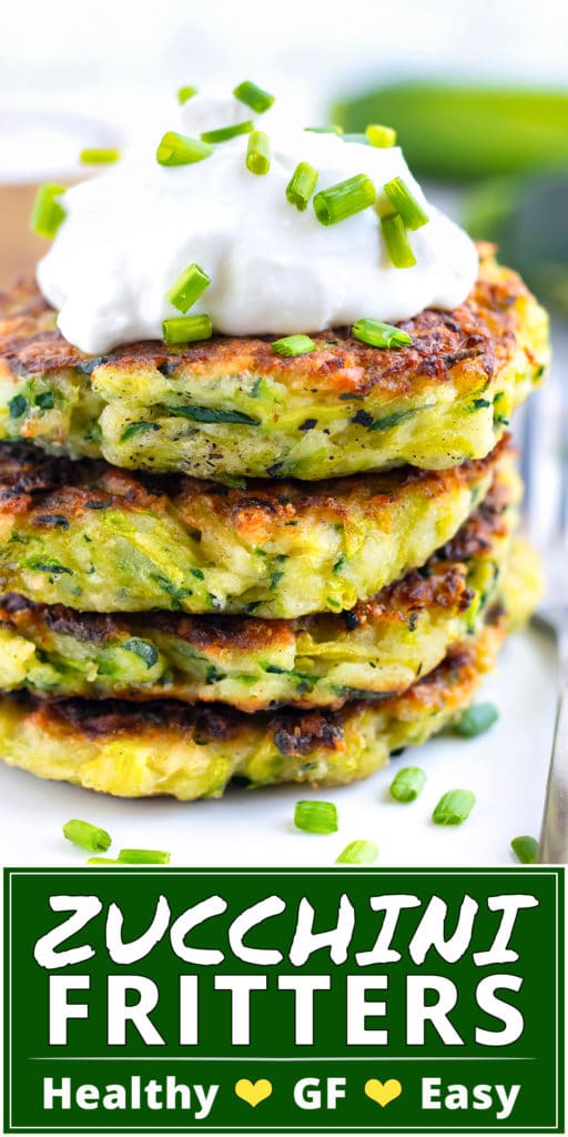 Four zucchini fritters in a stack on a white plate.