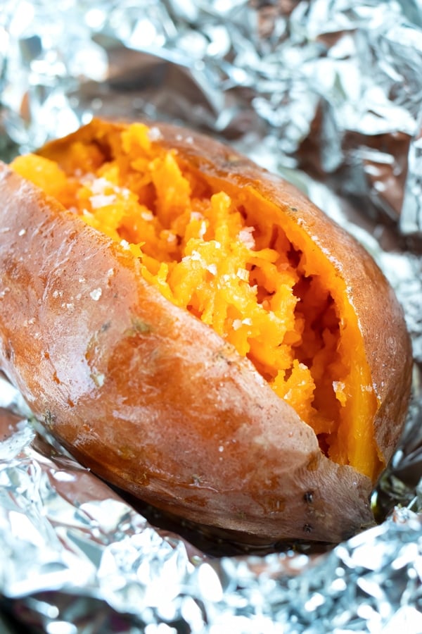 Medium-sized sweet potato that has been baked in the oven.