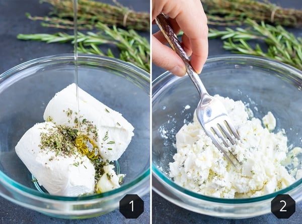 Goat cheese, fresh herbs, and honey being mixed together in a glass bowl for a recipe.