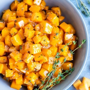 A healthy and easy side dish recipe for maple roasted butternut squash cubes.