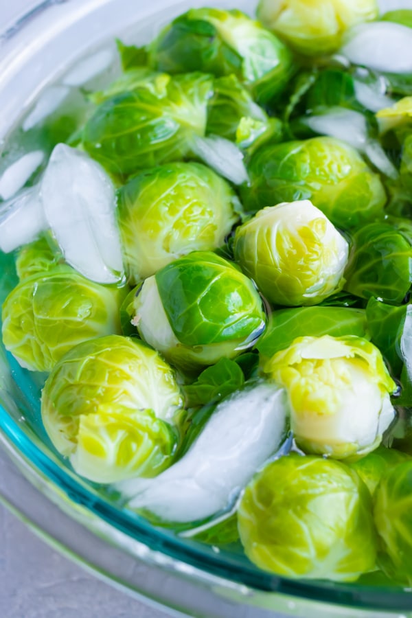 Brussels sprouts in an ice bath