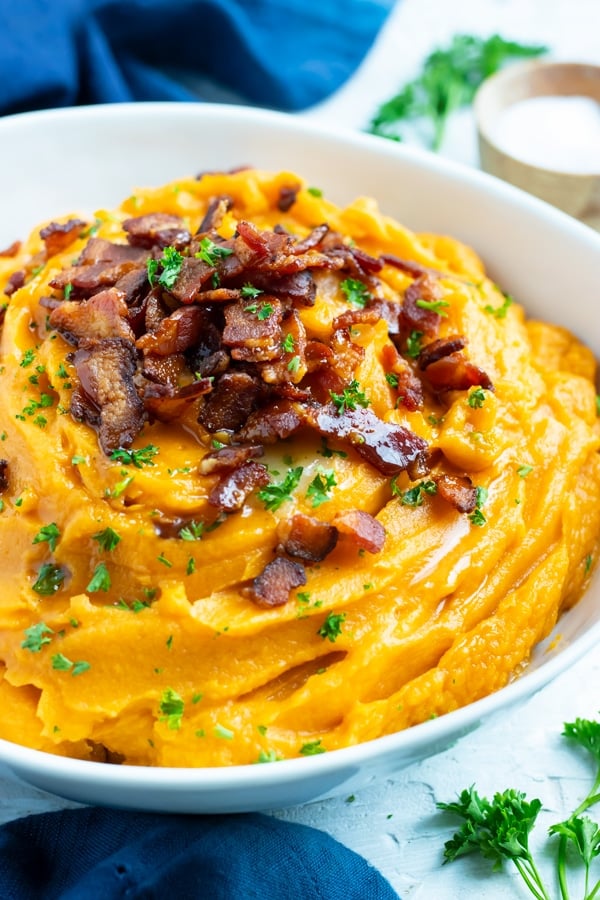 Boiling sweet potatoes to be used in a mashed sweet potatoes recipe with bacon.