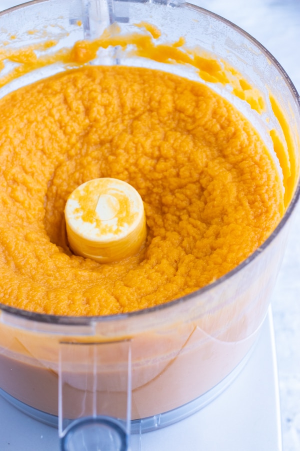 Mashed sweet potatoes in a food processor.