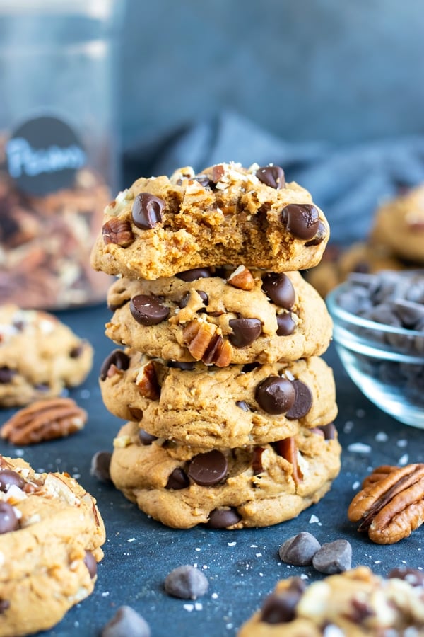 A stack of gluten-free chocolate chip cookies that are fluffy, chewy, and soft.