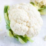 A head of cauliflower that is a low-carb, vitamin-packed, nutritional powerhouse of a cruciferous vegetable.