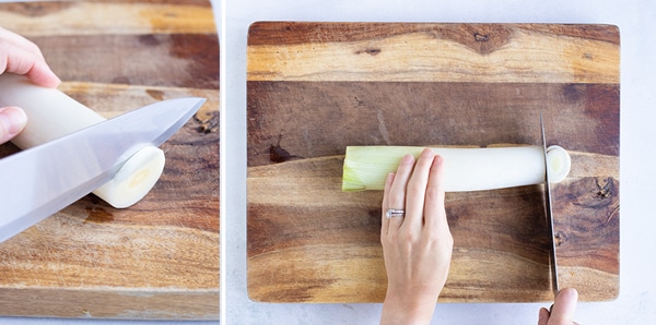 A cutting board with a fresh leek on it and cutting it into round slices.