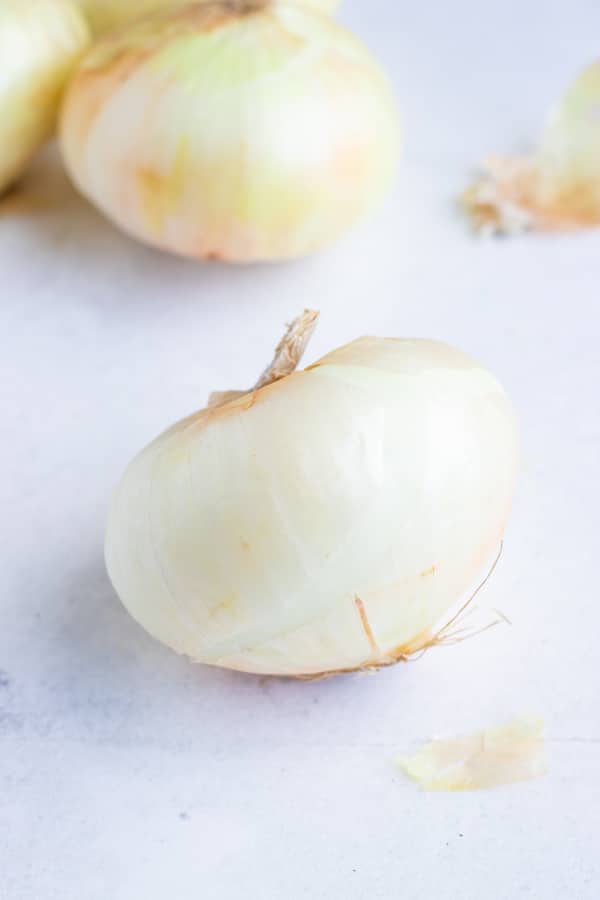 Cut yellow onions add delicious flavor to savory dishes.