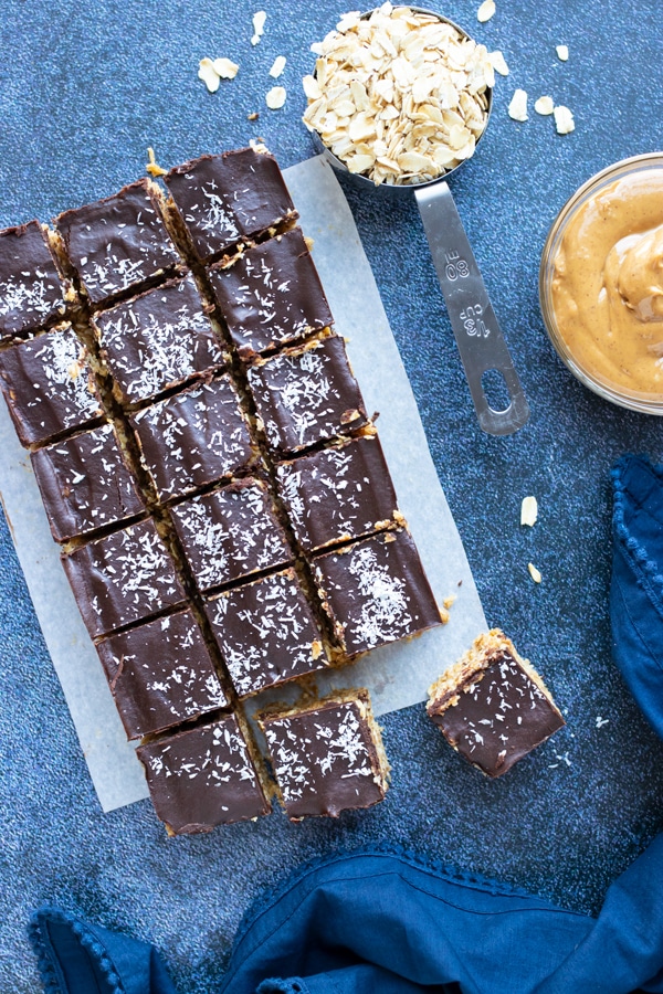 No-bake Oatmeal bars that taste like the Girl Scout Samoa Cookie with coconut and peanut butter.