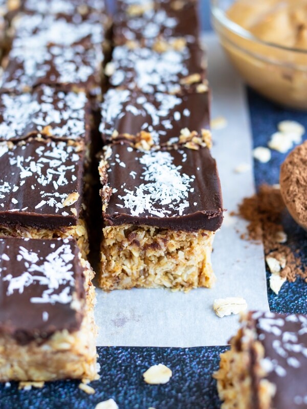 Healthy, vegan, and gluten-free, chocolate peanut butter oatmeal bars with shredded coconut.