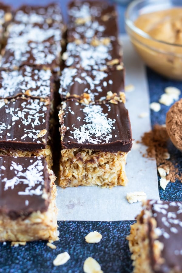 Healthy, vegan, and gluten-free, chocolate peanut butter oatmeal bars with shredded coconut.