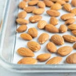 Season roasted almonds with sea salt before popping them in the oven.