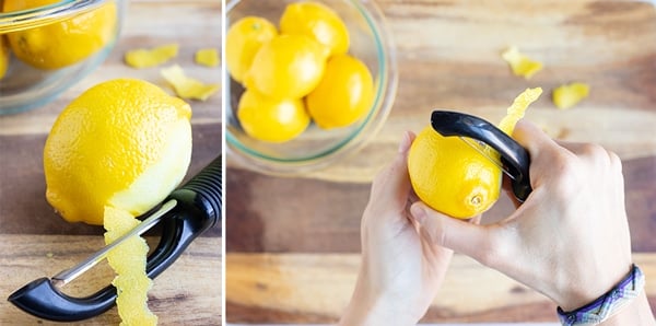 Showing how to use a vegetable peeler to remove the peel from a lemon.