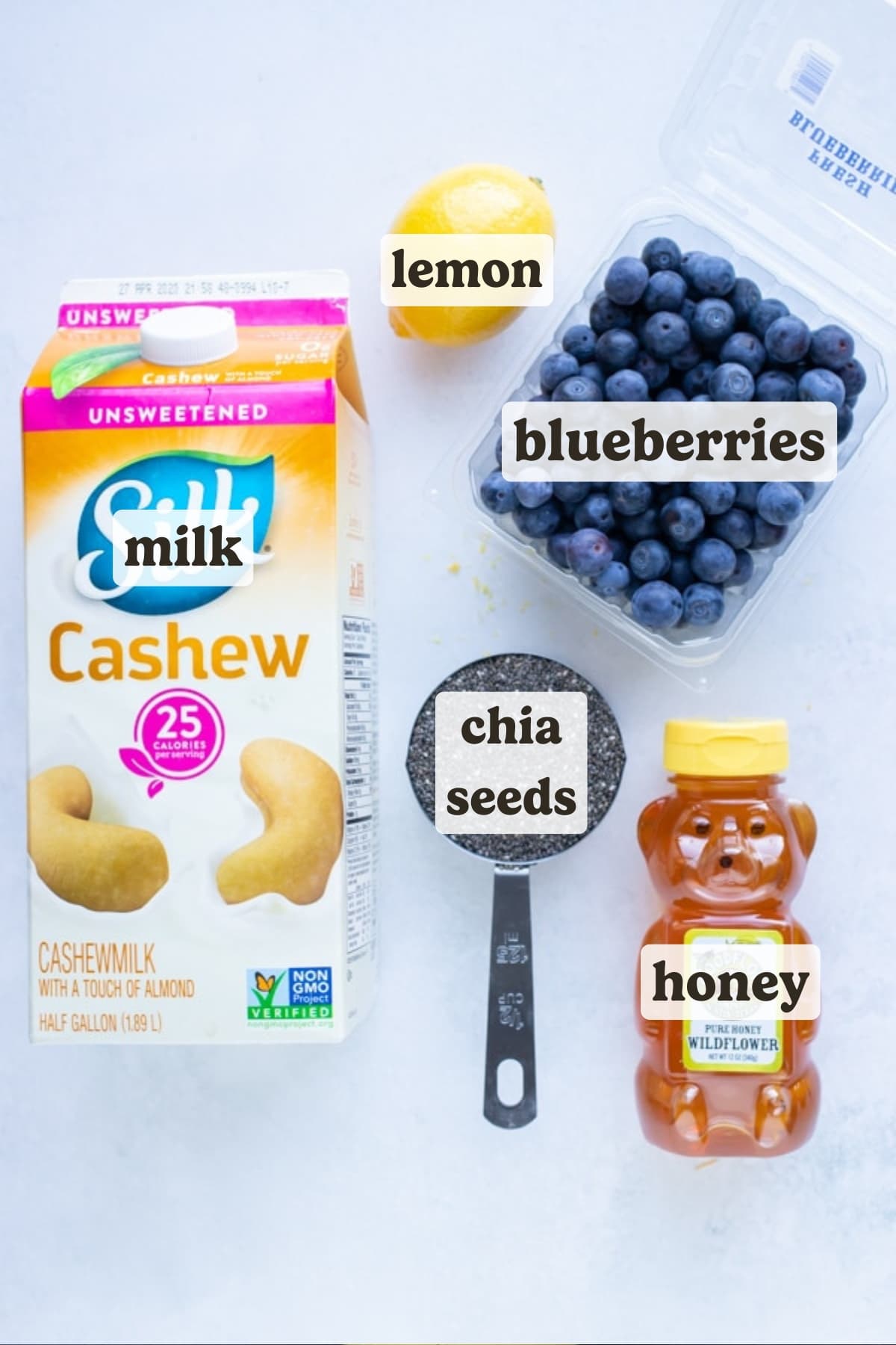 Cashew milk, black chia seeds, honey, a lemon, and blueberries are the main ingredients for this chia pudding.