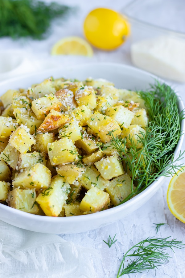 Parmesan roasted potatoes with lemon zest and fresh dill.