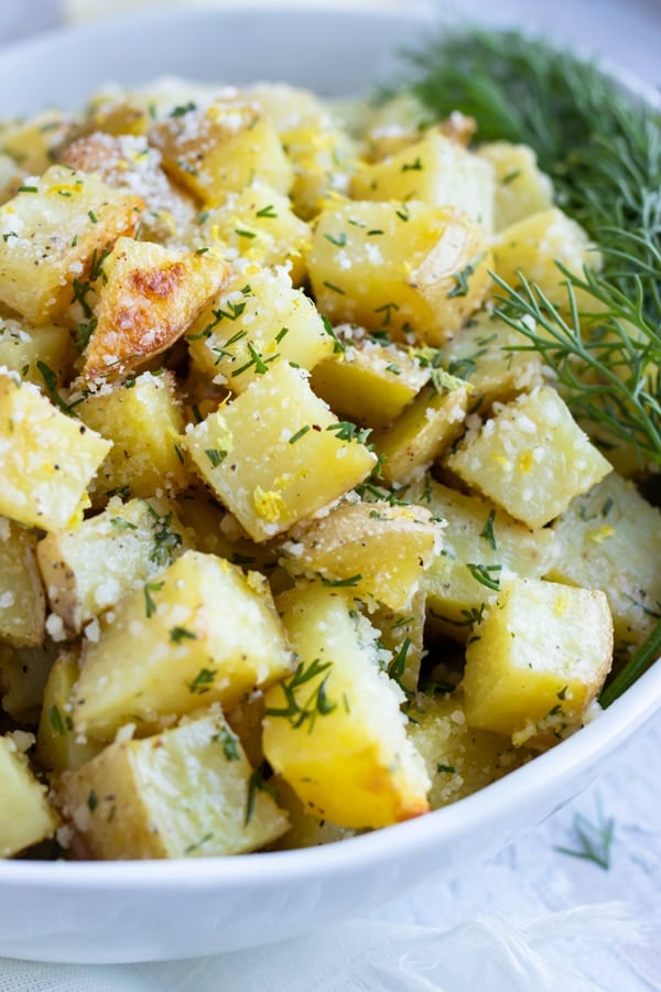 An easy vegan and Whole30 potato side dish recipe with lemon, dill, and butter sauce.