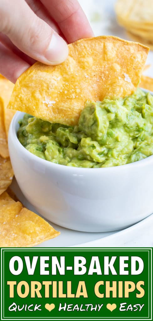 A chip being dipped into guacamole.