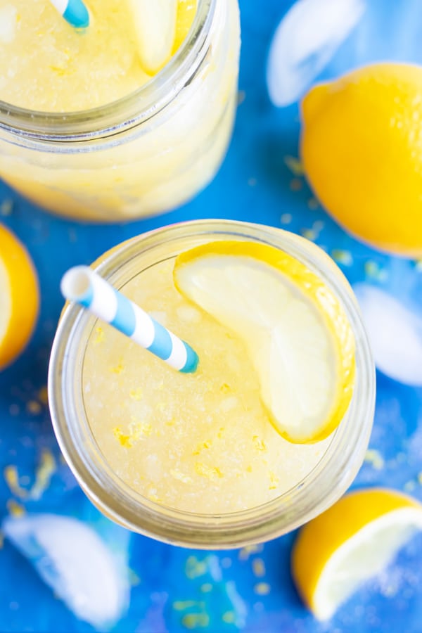 An easy summer drink for kids made with freshly squeezed lemons, ice, and a sweetener.