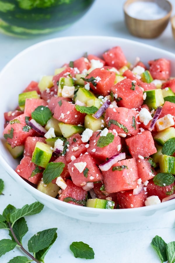 A quick, easy, and healthy watermelon fruit salad recipe with cucumber, feta cheese, and mint.