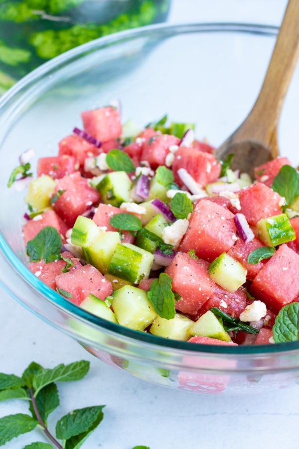 A watermelon feta salad to be served as a summer picnic side dish.