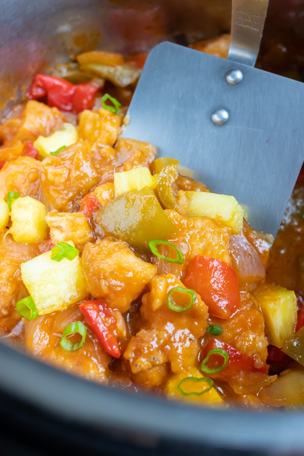 Pineapple, bell peppers, and chicken are mixed together for this healthy Hawaiian chicken recipe.