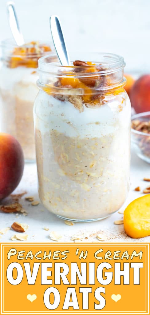 Mason jar peach cobbler overnight oats are topped with fresh peaches and toasted pecans.