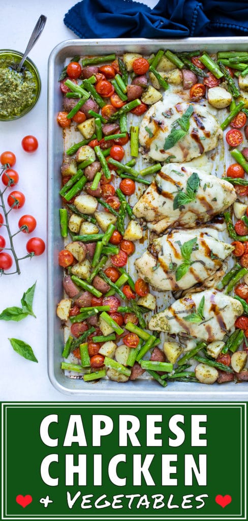Baked caprese chicken is drizzled with balsamic vinegar and topped with fresh basil in this sheet pan meal.