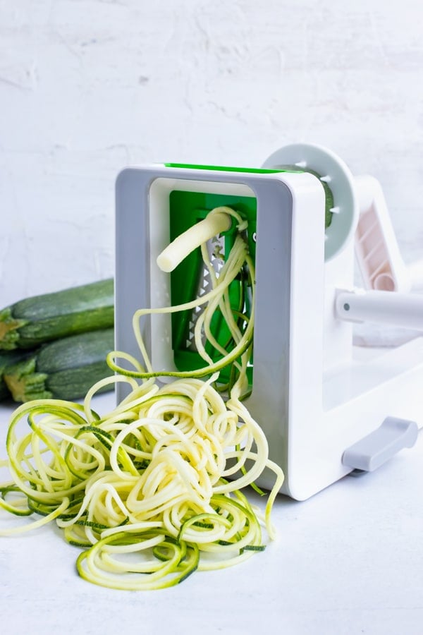 How to make zucchini noodles using a countertop spiralizer.