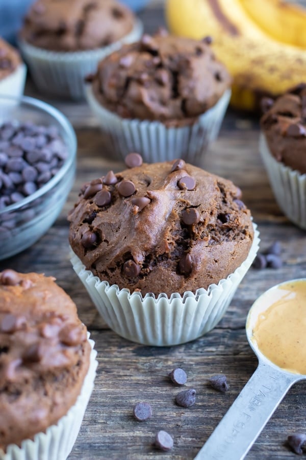 Made with mashed bananas, peanut butter, and chocolate chips, these muffins are kid friendly and easy to prepare.
