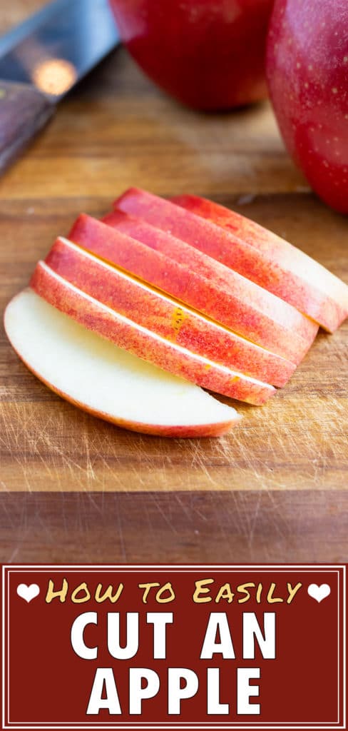 Fresh apple slices are laid on the counter before adding to apple pie or oatmeal.