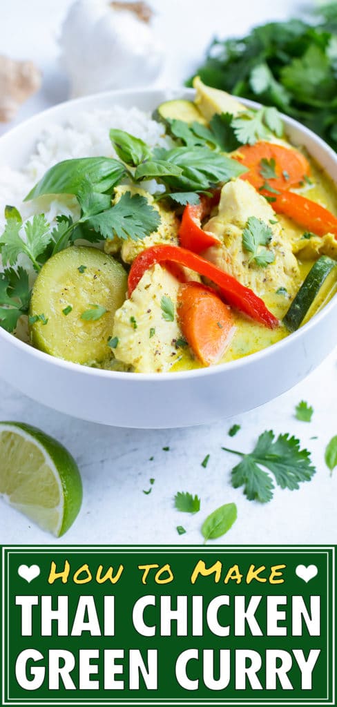 Top green chicken curry with fresh basil and lime juice for a homemade Thai dinner.